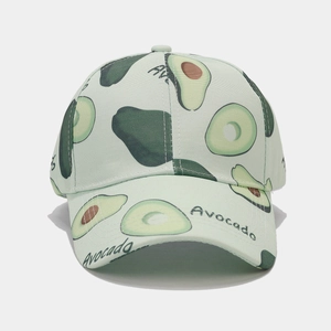 Detail of light green baseball cap with avocado prints and Avocado text embroidery