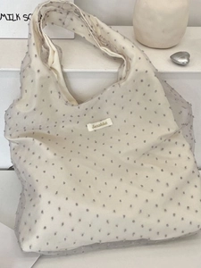 Cream large capacity organza tote bag with textured polka dots for casual commuter use