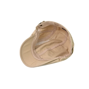 Detail of cotton flat cap interior with reinforced sweatband and metal buckle