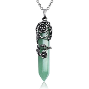 Close-up of green aventurine hexagonal crystal pendant with vintage silver flower wrap