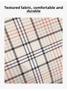 Close-up of beige plaid fabric texture on a large tote bag showing knitting details