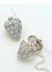 Sparkling silver heart-shaped jewelry box with sequin details and rhinestones decoration