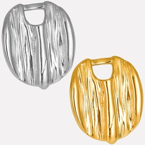 Detailed view of hammered gold and silver irregular rectangular pendant charms