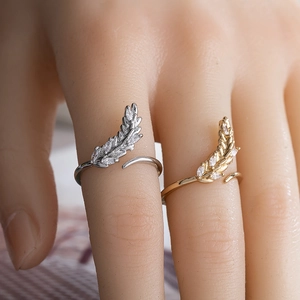 Olive leaf feather rings in gold and silver finish with sparkling zircon stones
