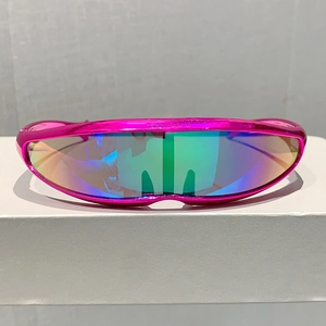 Detail of futuristic rose red wrap around sunglasses with multi-color gradient lenses