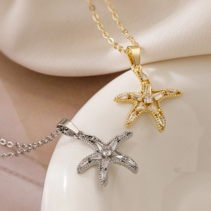 Starfish pendant necklace in gold and silver plating with pave-set cubic zirconia stones
