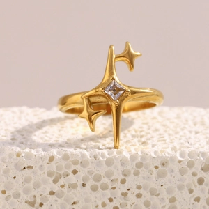 Macro view of 18K gold plated triple-layer star ring with square zircon stone