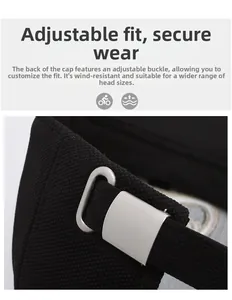 Detail of adjustable silver metal buckle and strap on the black vintage baseball cap