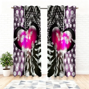 Detailed view of velvet curtains with pink hearts and zebra print for indoor decor