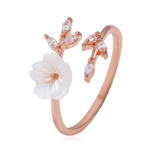 Minimalist rose gold floral open ring with white shell flower and crystal leaf details