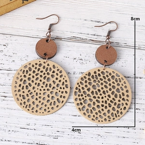Detail view of retro geometric wooden earrings showing 8cm height and 4cm width dimensions