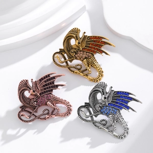 Flying dragon brooch set with rhinestones in gold, rose gold, and silver finishes