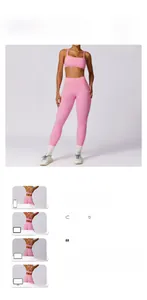 Detailed close-up of pink yoga set with cross-back sports bra and high-waist leggings