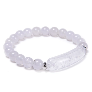 Detail of white crystal beaded bracelet with a long transparent quartz centerpiece