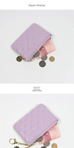 Detailed interior of purple quilted coin purse showing zipper and storage capacity