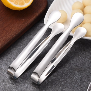 Polished 304 stainless steel sugar tongs and ice tongs for serving on dark countertop