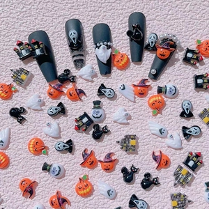 Halloween 3D resin nail art charms featuring ghost, pumpkin, and bat on mixed press-on nails