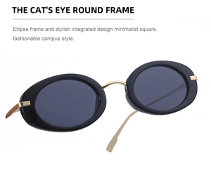 Dettaglio occhiali da sole ovali cat-eye retrò con montatura nera e aste in metallo oro
