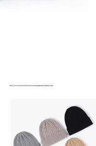 Detail of rib-knitted merino wool beanies in light grey, dark grey, beige, and black