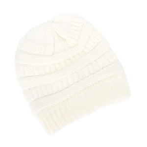Close-up of white knit beanie showing thick ribbed texture and warm satin-lined fabric