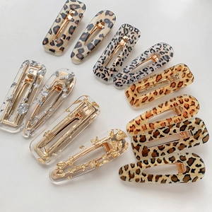 11-piece leopard print and gold foil acrylic hair clip set in rectangle and drop shapes