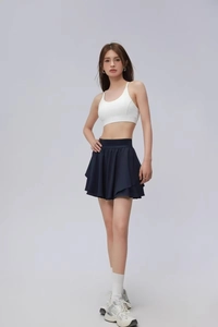 Jupe de sport plissée bleu foncé à taille haute avec short de protection intégré sport