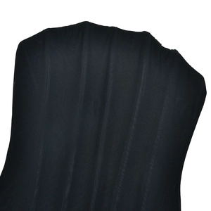 Macro shot of breathable black mesh fabric texture for off-shoulder mini dress detail