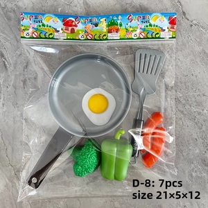 7-piece kids play kitchen set with frying pan and play food in 21x12cm packaging