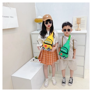 Kids school bus chest bags in yellow and green worn by models for size perspective
