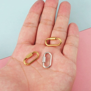 Handheld view of multi-purpose stainless steel screw lock clasps in gold and silver