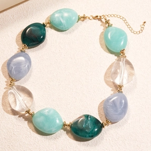 Bohemian beaded seashell necklace with irregular green and blue resin stones