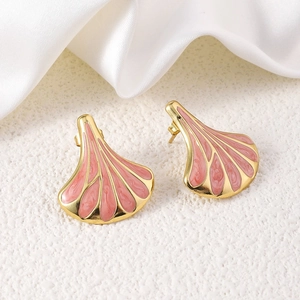 Close-up of fan-shaped pink enamel earrings with gold plating and marble texture finish
