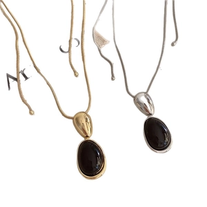 French vintage oval resin pendant necklace with sleek snake chain in gold and silver finish