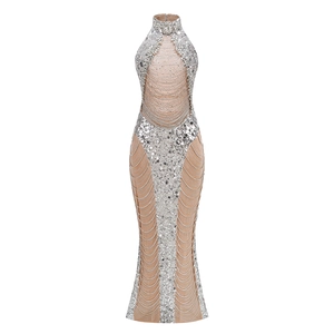 Silver sequin high neck evening gown with cascading diamond chains and mermaid hemline