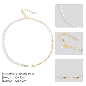 Detail of 14K gold stainless steel necklace with freshwater pearls and paperclip chain