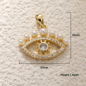 Detailed view of 20mm gold evil eye pendant with pearls and cubic zirconia