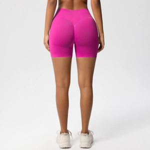 Macro view of seamless high waist yoga shorts featuring V-shape peach butt lifting design