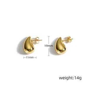 Detailed view of gold teardrop earrings with dimensions 19mm height and 11mm width