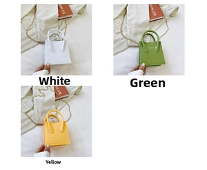 Detailed view of crocodile pattern mini bags with gold chain straps in multiple colors