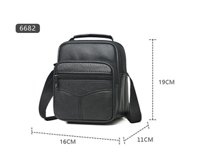 Detail showing height 19cm, width 16cm and thickness 11cm of black leather crossbody bag