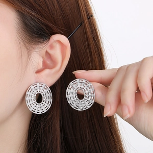 Modern woven hollow circular stud earrings in polished silver finish for women