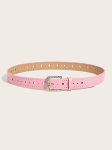 Detail of pink PU leather belt with heart cutouts and rhinestone square buckle
