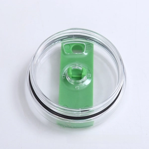 Close-up of clear 40oz tumbler lid with green slider and black sealing ring
