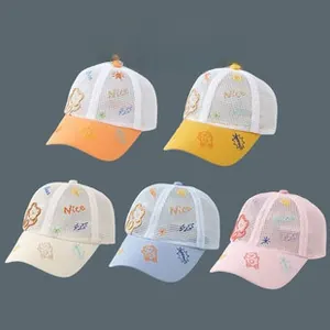 Detailed close-up of breathable mesh back and cartoon bear embroidery on kids baseball caps