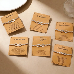 6-piece infinity charm bracelet gift set with sparkling cubic zirconia on cards