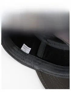 Detail view of cotton hat interior featuring breathable mesh and wide sweatband
