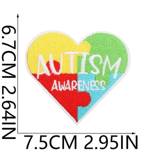 Detailed embroidery view of heart-shaped autism awareness puzzle patch with size measurements