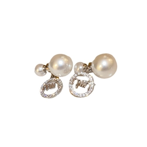 Silver needle pearl earrings with Miu logo pendant and zircon crystals on white background