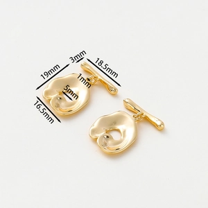 Macro detail of 14k gold-plated OT toggle clasps for jewelry making with precise measurements