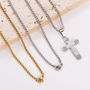 Minimalist stainless steel box chain necklaces with a detailed religious cross pendant